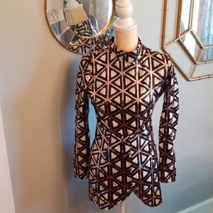 AKIRA Black, White & Rose Gold Geometric Sequin Long Sleeve Romper